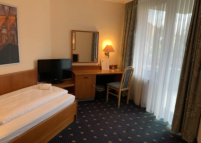 Отель Karaman Group Бад-Нендорф